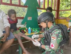 Satgas Yonif 116/Garda Samudra Lakukan Komsos dan Berikan Layanan Kesehatan di Desa Banti