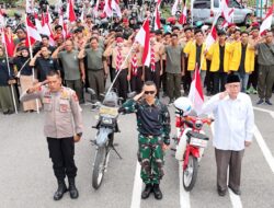 Ribuan Peserta Antusias Mengikuti Pawai Bendera Merah Putih Start Dari Makodim 0105/Abar Finish Di Tugu Pancasila